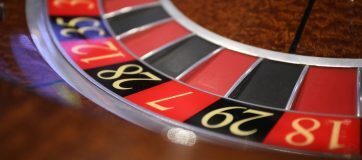 close up of the slots on a roulette wheel