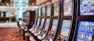 row of slot machines in casino